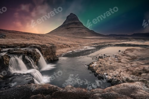 Preview: Northern lights aurora borealis over kirkjufell waterfall in Iceland