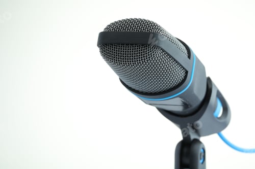 Preview: Stand with microphone on white background, closeup. Space for text