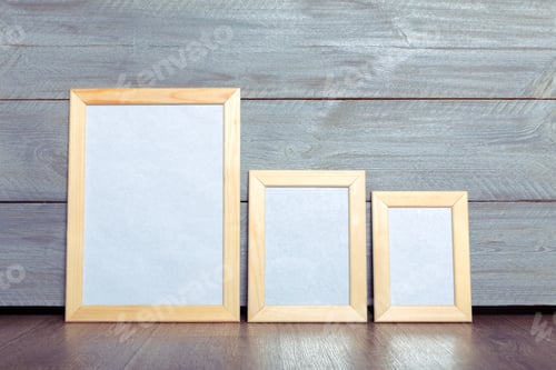 Preview: photo frames on the wooden wall