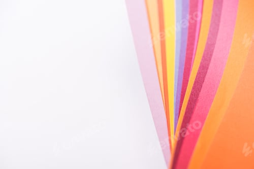 Preview: top view of colorful and bright papers isolated on white