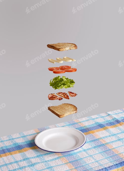Preview: Floating sandwich ingredients perfectly aligned above a plate.