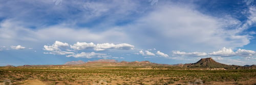 Preview: Clouds above the Chisos Mountains in Big Bend National Park, view across the dry landscape.