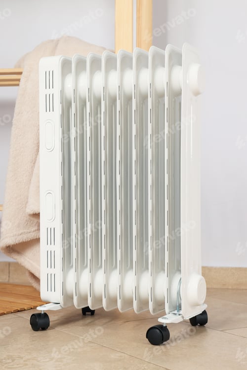 Preview: Concept of heating season, modern electric heater in room