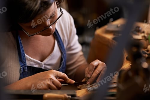 Preview: Crafted with care. An artist creating something out of wood.