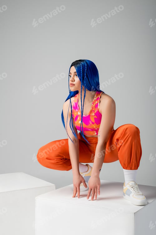 Preview: vibrant clothes, dyed hair, female model with blue hair posing