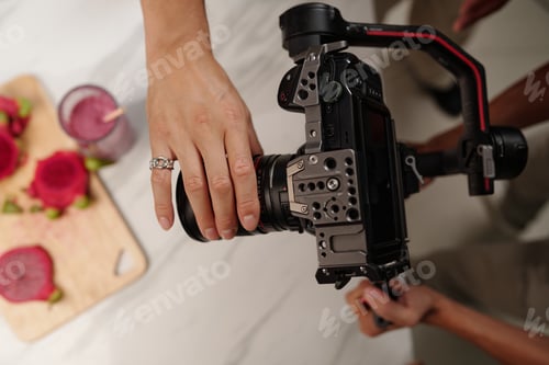 Preview: Cameraman Shooting Food Content On Camera