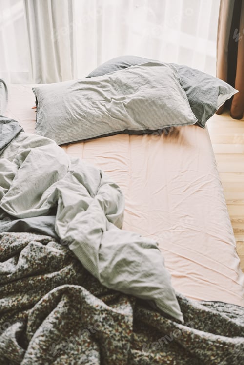 Preview: Cushion and blanket on bed Top view