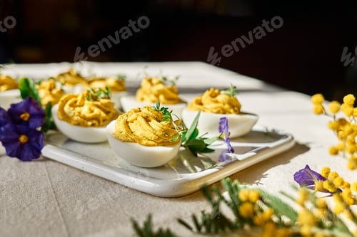Preview: Stuffed easter eggs mimosa with egg yolk, turmeric, cream cheese and cress salad.