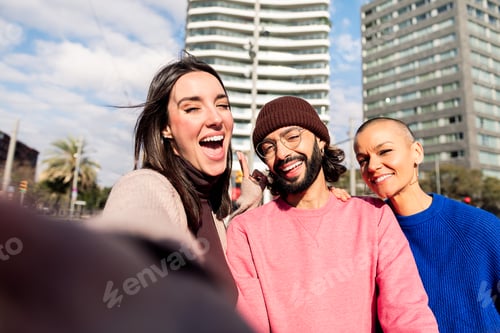 Preview: selfie of three friends having fun in the city
