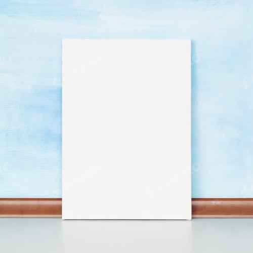Preview: Blank canvas frame against blue wall