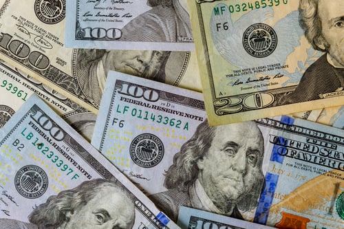 Preview: One hundred american dollars banknotes close up background.