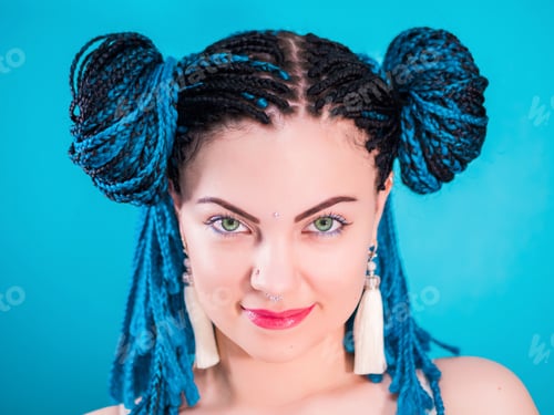 Preview: Glamour portrait of sexy woman with african blue braids hairstyle, bindi, nose ring isolated on blue