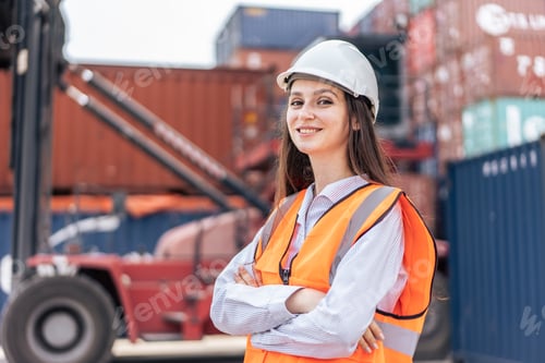 Preview: Portrait of Caucasian engineer worman work in container port terminal.