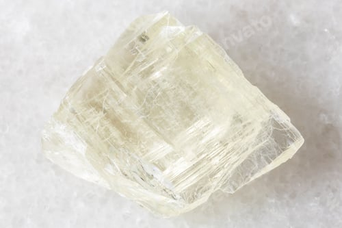 Preview: sample of rough spodumene mineral on white marble