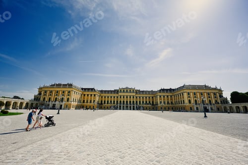 Preview: Mother with children walking at Schonbrunn Palace in Vienna, Austria.