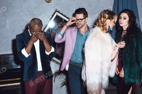 Preview: group of beautiful multiethnic friends on party