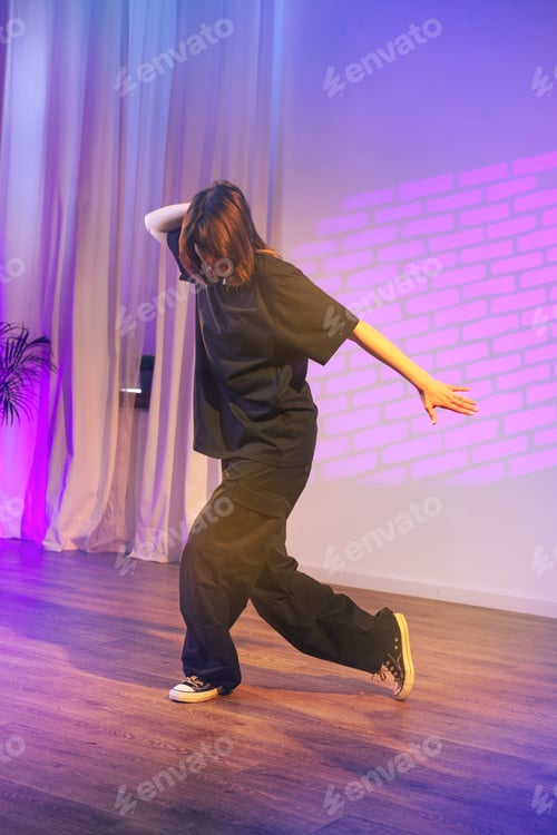 Preview: Dynamic dance performance in a vibrant studio setting during a creative workshop