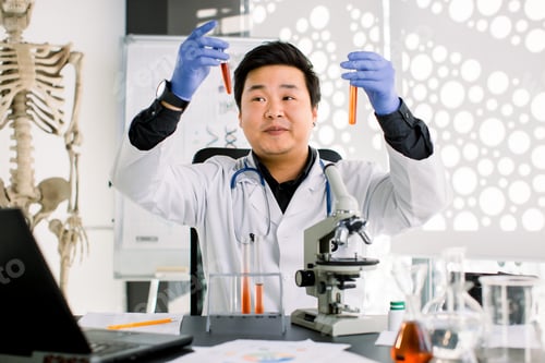 Preview: science, chemistry, biology, medicine and people concept - close up of young Asian Japanese male
