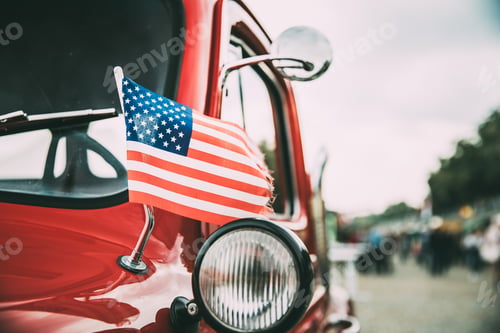 Preview: Close Side View Of Red Pickup Truck With Small American Flag Wav