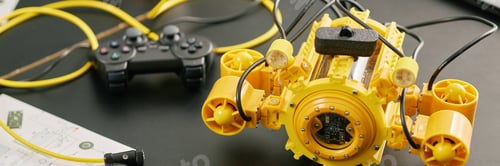 Preview: Header Image of Displaying Yellow Submersible Device with Controls and Wires
