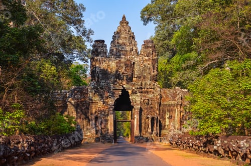 Preview: Entrance to ancient Angkor Wat temple at sunrise