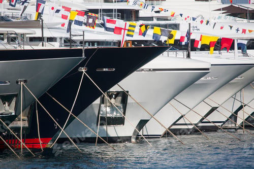 Preview: Close up of a row of luxury yachts moored in Port Hercule, Monte Carlo, Monaco