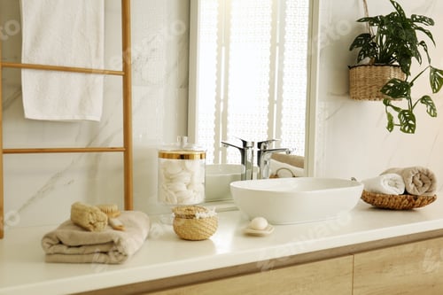 Preview: Large mirror and vessel sink in stylish bathroom