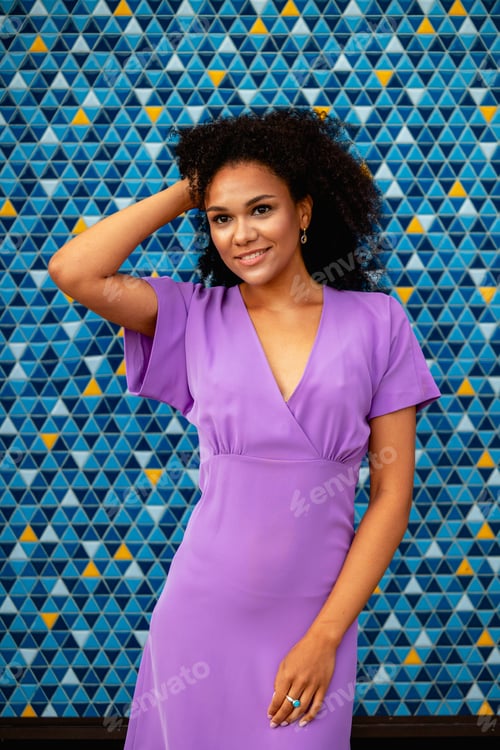 Preview: beautiful girl in a dress on a colored background