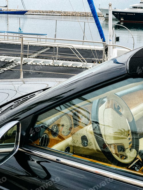 Preview: Luxury car interior parked in Puerto Banus, Marbella, Spain.