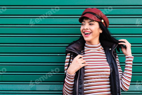 Preview: young moroccan girl with short hair with fall outfit - fall concept