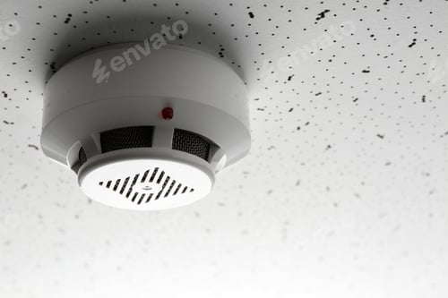 Preview: Smoke detector on light textured background, space for text. Alarm system