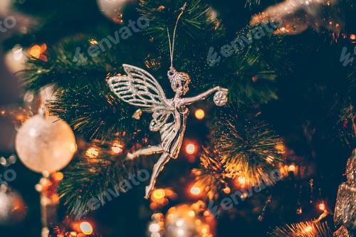 Preview: Decorated Christmas tree with holiday ornaments. Beautiful Christmas ballerina toy.