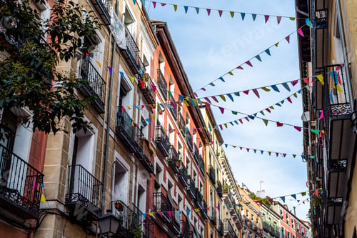 Preview: Street decorated with pennants in the traditional neighborhood of Embajadores