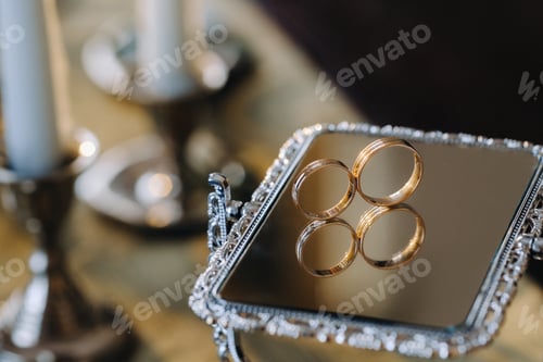 Preview: A pair of gold wedding rings.Two wedding rings