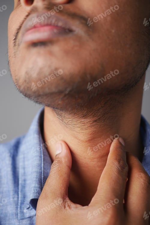 Preview: unrecognized man suffering throat pain close up