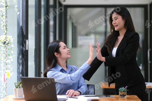 Preview: Young Asian business team creative businesspeople coworker in office Happy