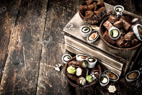 Preview: Chocolate candies in a bowls.