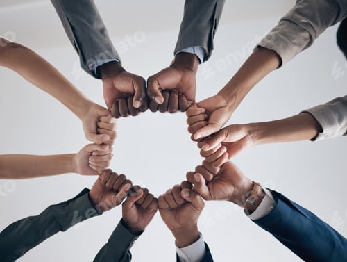 Preview: Team, motivation and support with hands fist bump of corporate partnership office workers. Work com