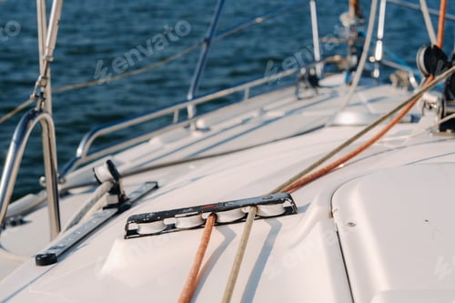 Preview: rope on the winch of a white yacht in the sea.yacht equipment