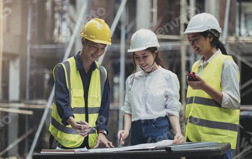 Preview: A diverse team of experts are planning on the construction site. Real estate project with civil