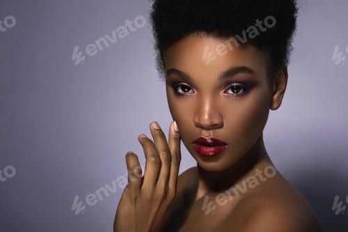Preview: Young African model with a beautiful makeup