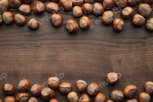 Preview: Hazelnuts On The Brown Wooden Table