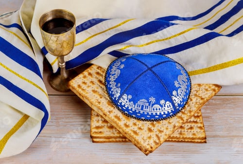 Preview: Pessach matzo with kiddush cup of wine in the kippa