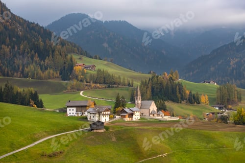 Preview: Green alpine valley with view of Santa Maddalena village church,