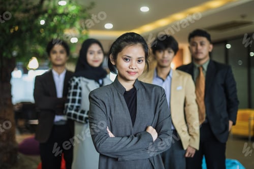 Preview: Young multiracial business people covering faces hiding behind blank mockup signs