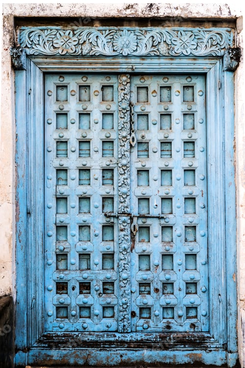 Preview: big carved wooden door with peeling paint