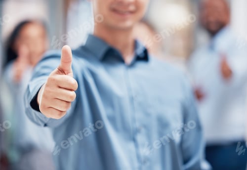 Preview: Shot of a group of unrecognizable businesspeople showing a thumbs up in an office at work