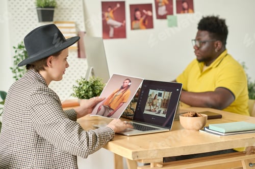 Preview: Professional editor working with laptop at office