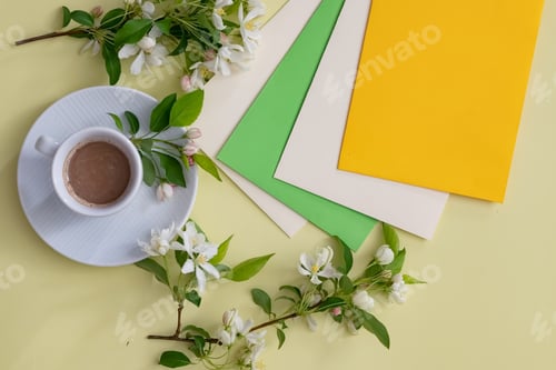 Preview: Workspace setup with coffee cup, notebook, pencil, and keyboard on wooden table