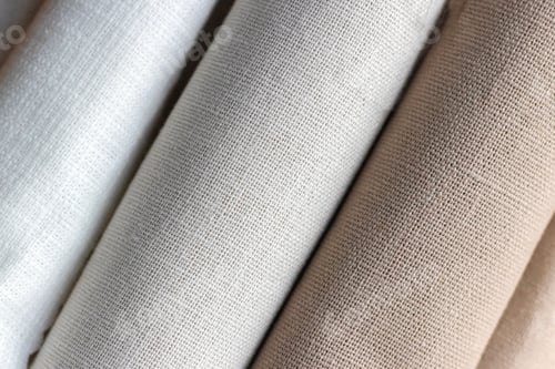 Preview: Diagonal textural background of natural linen fabric